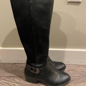 Tall black leather boots